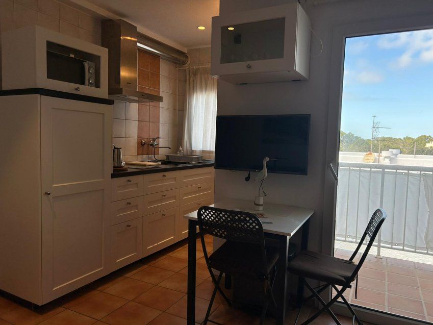 Cocina con microondas y nesspreso